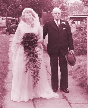 Mom and her father, England, 1950